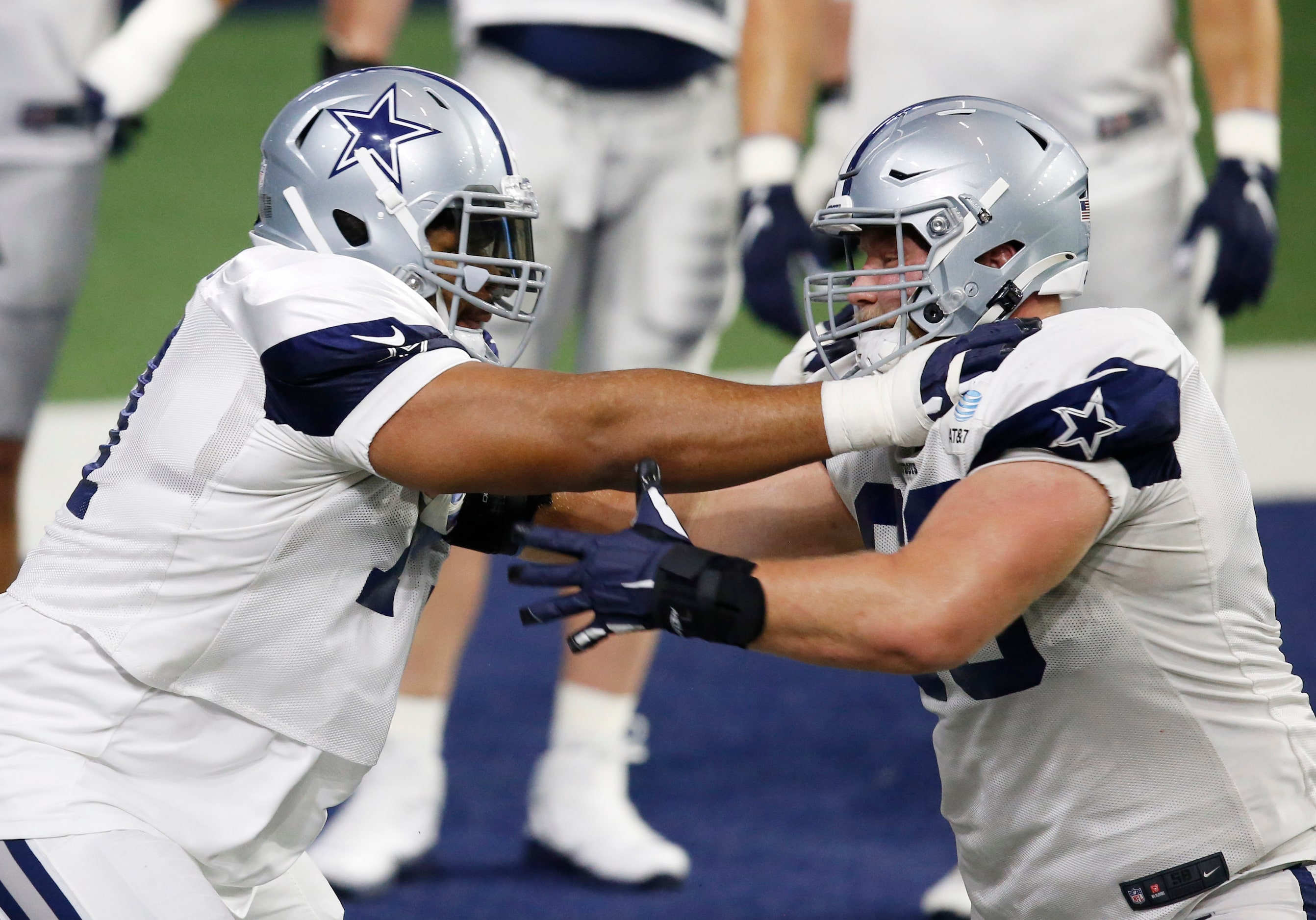 Dallas Cowboys offensive tackle La'el Collins (71) blocks Dallas Cowboys center Tyler...