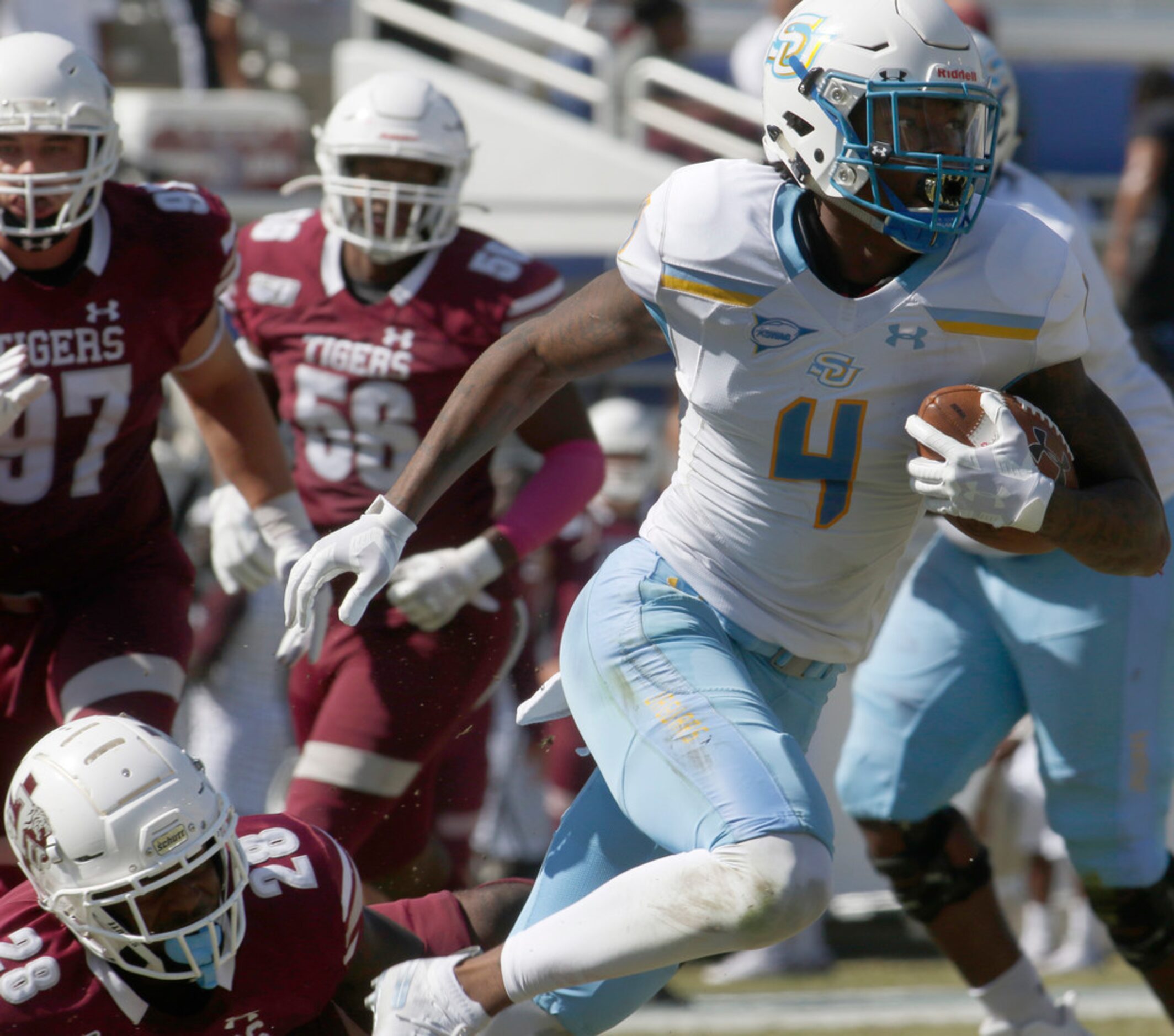 Southern receiver Hunter Register (4) pulls away from Texas Southern linebacker Patrick...