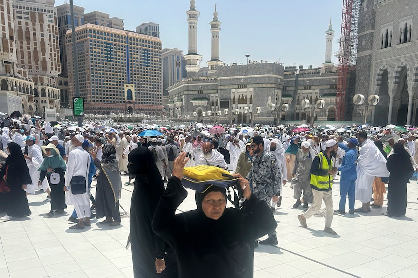 Pilgrims leave after offering prayers outside at the Grand Mosque, during the annual Hajj...