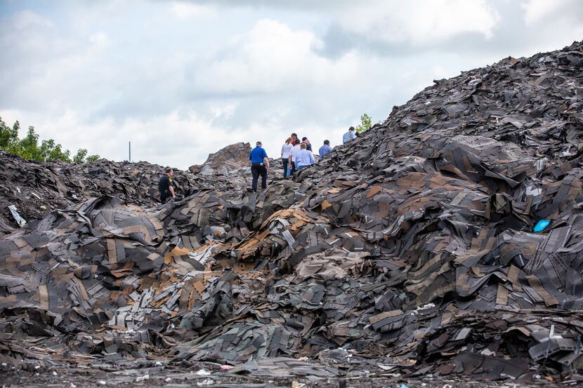 A group of attorneys and city officials, including Judge Gena Slaughter, tours the mountain...