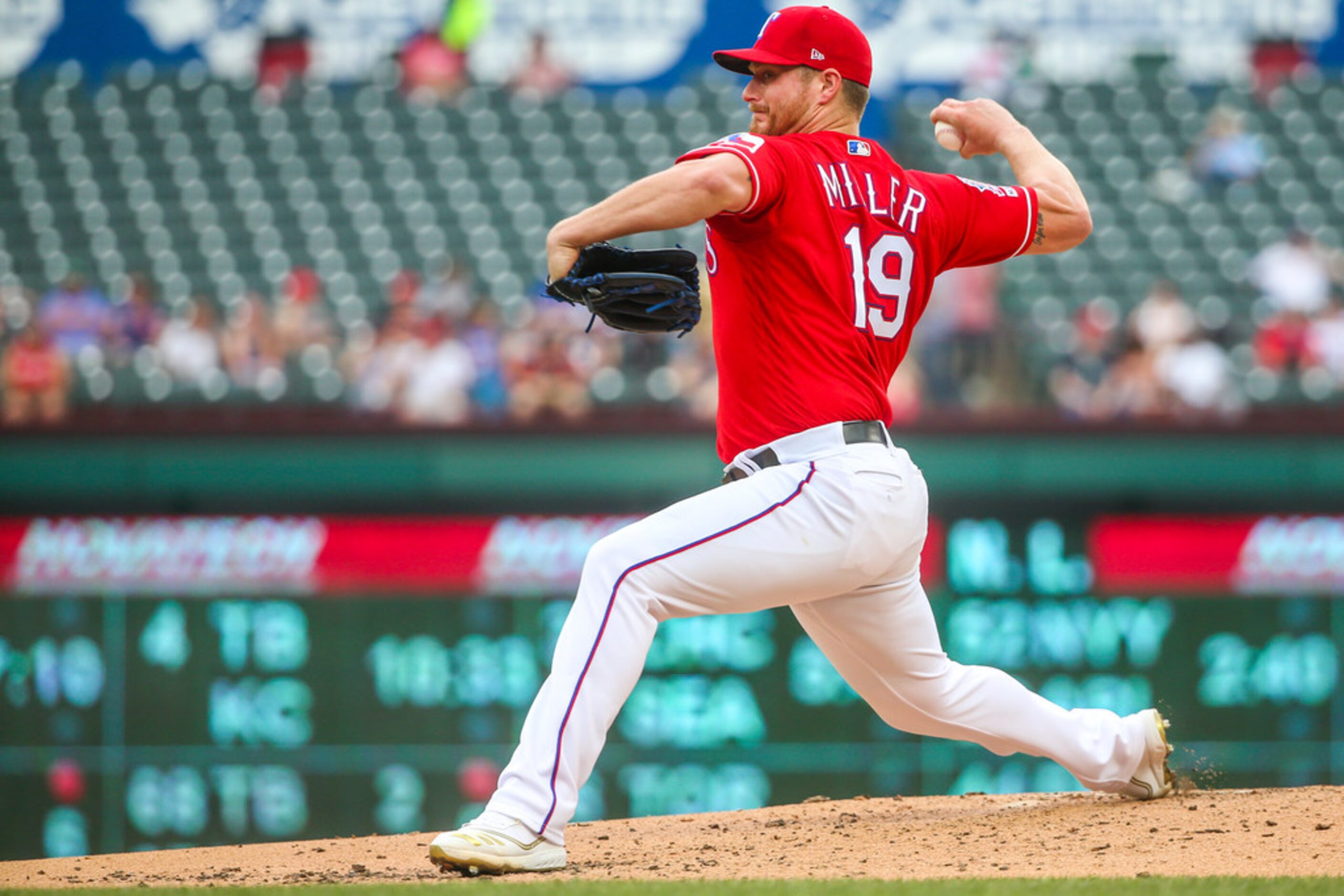 Texas Rangers starting pitcher Shelby Miller (19) pitches during a Major League Baseball...