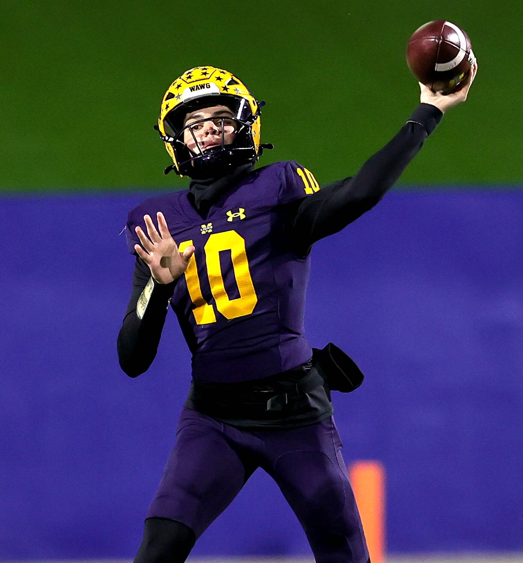 McKinney quarterback Jeremiah Daoud attempts a long pass against Prosper during the first...