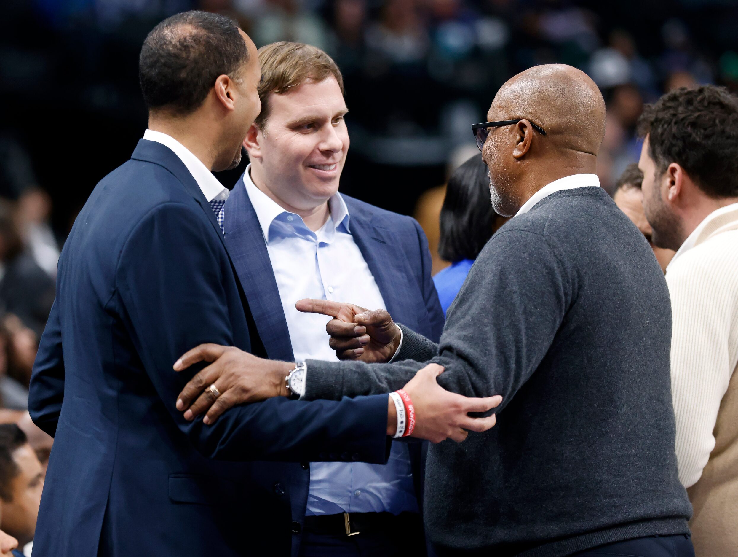 Dallas Mavericks new governor and majority owner Patrick Dumont (center) visits with former...