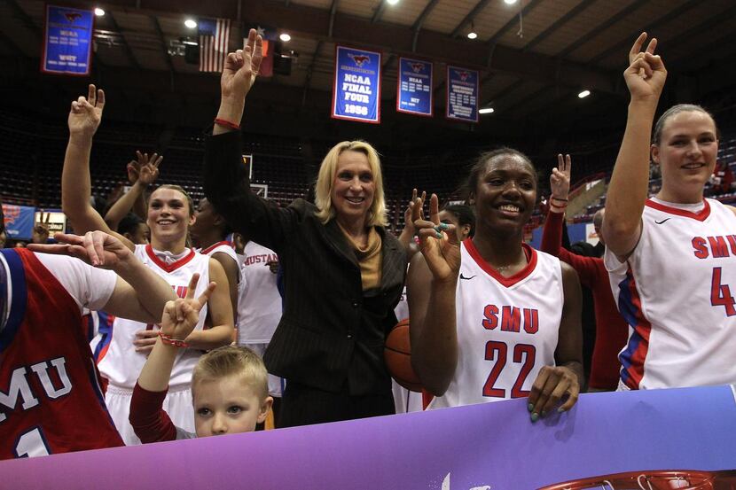 
SMU coach Rhonda Rompola and her players in February 2013, after a 69-60 win against Tulsa...
