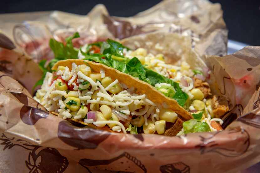 Chipotle is offering $2 tacos at most Dallas locations between the hours of 8-11 p.m., shown...