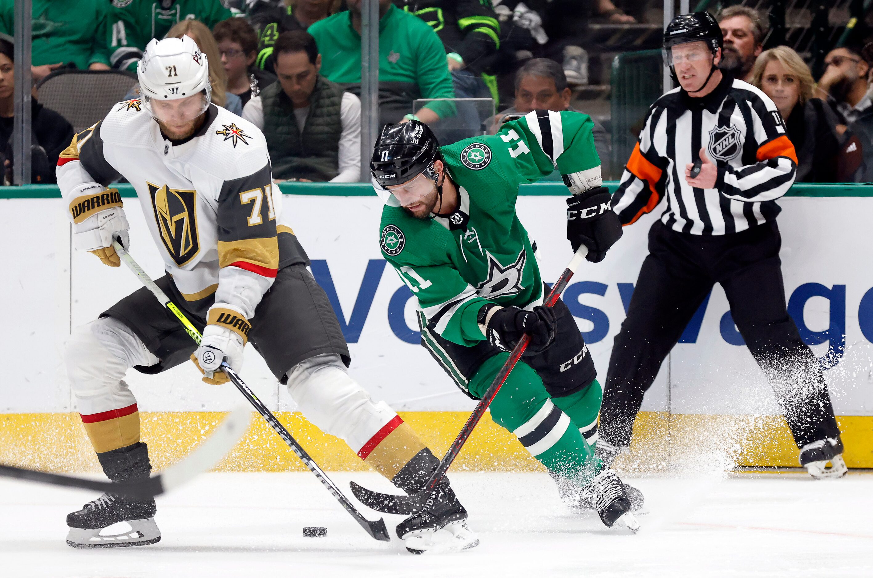 Dallas Stars center Luke Glendening (11) battles Vegas Golden Knights center William...