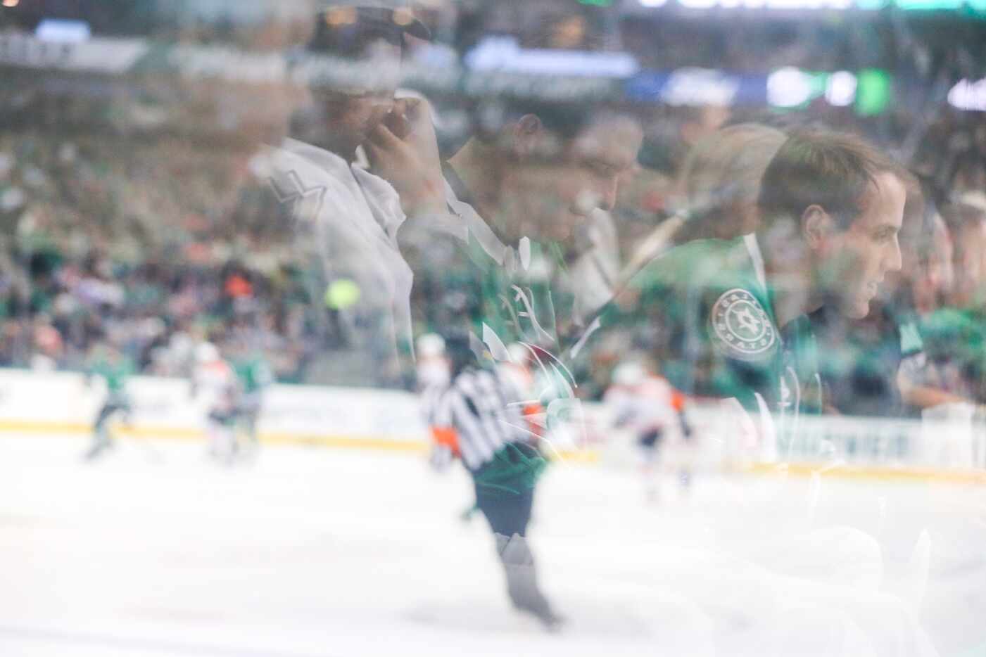 Stars fan Jeffrey Brown watches as the Stars take on the the Philadelphia Flyers during the...