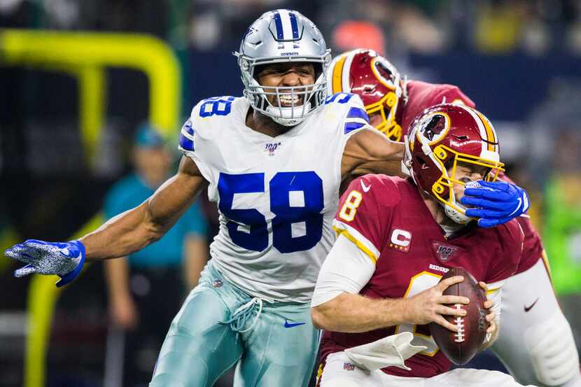 Dallas Cowboys defensive end Robert Quinn (58) sacks Washington Redskins quarterback Case...