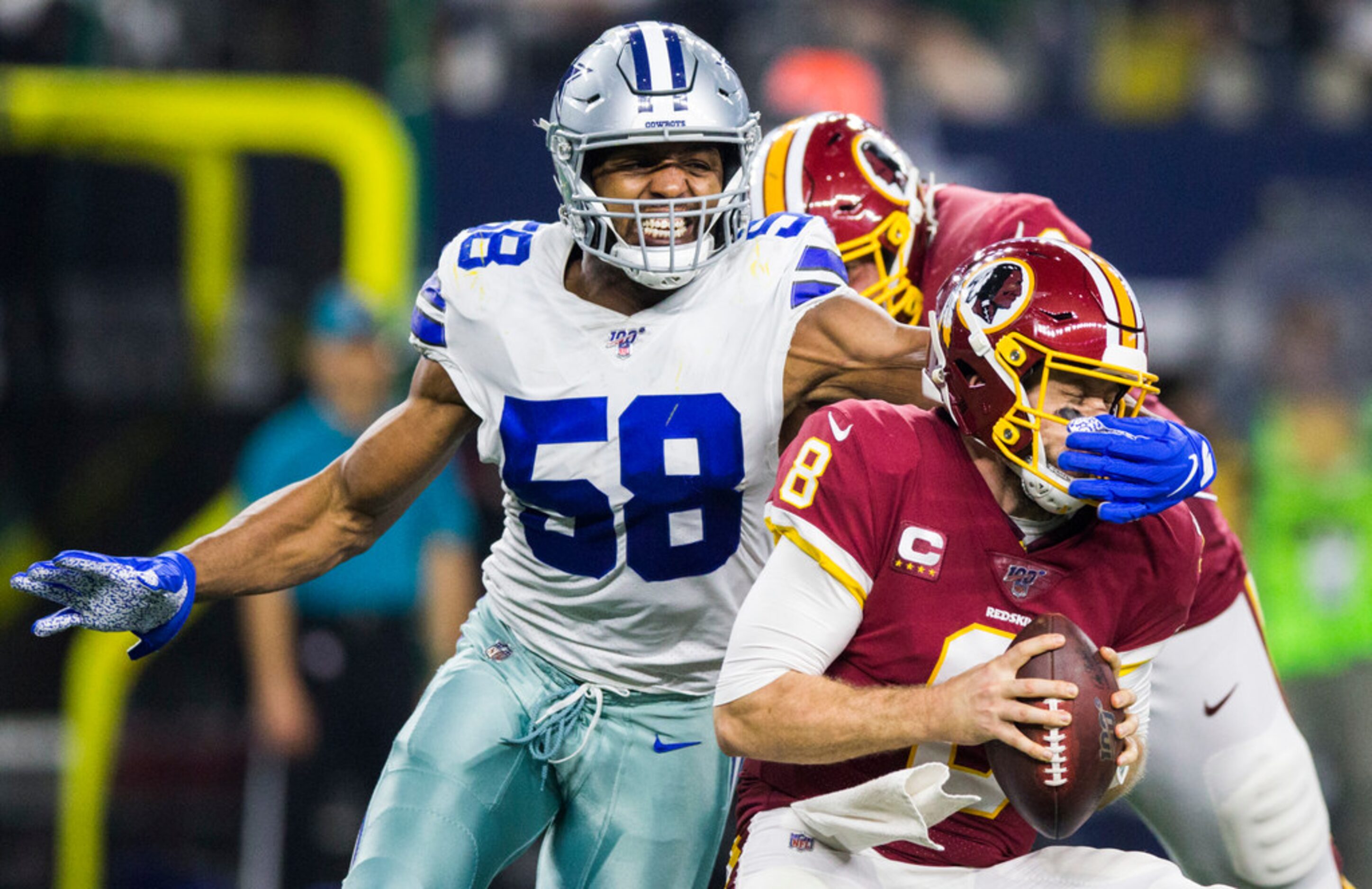 Dallas Cowboys defensive end Robert Quinn (58) sacks Washington Redskins quarterback Case...