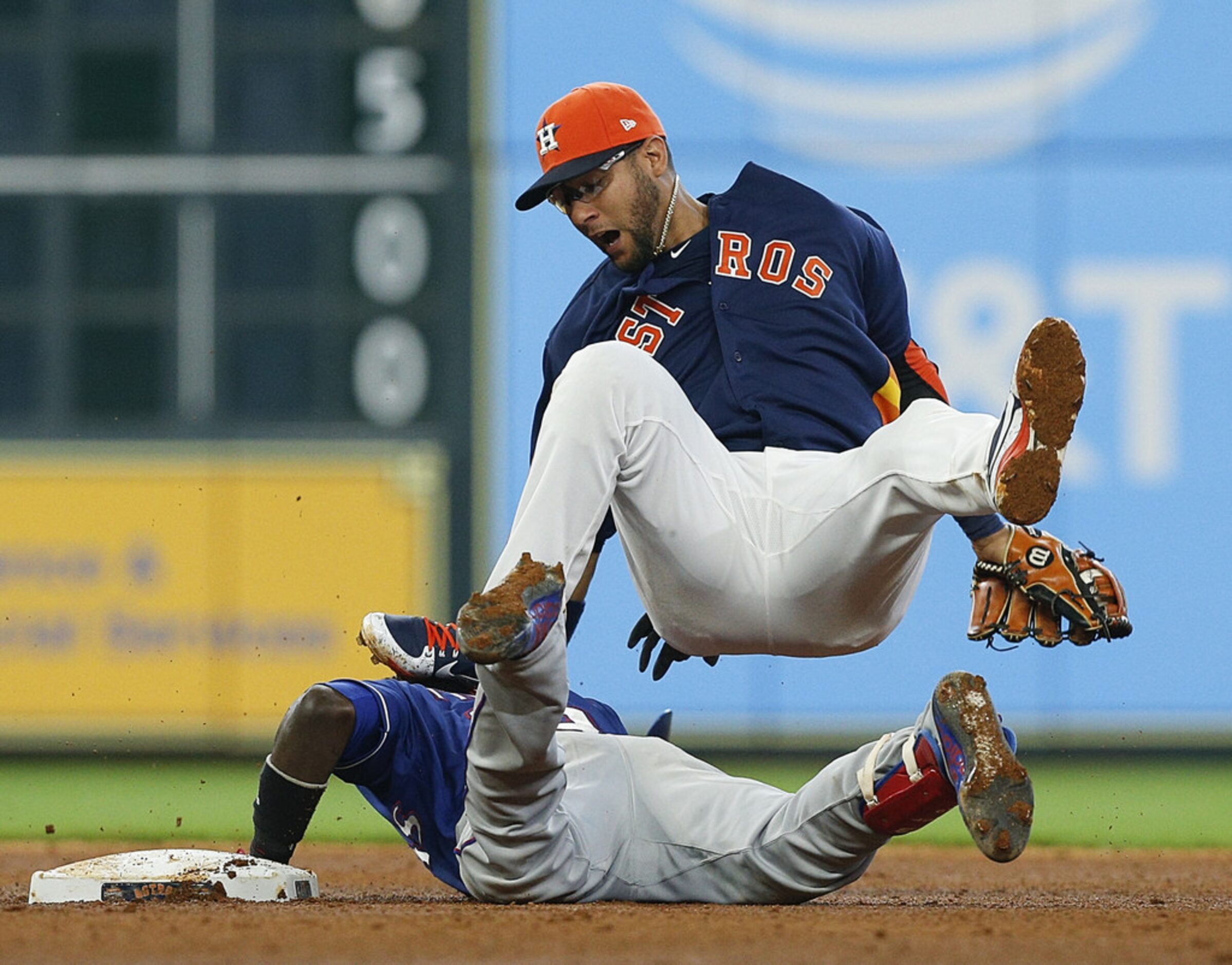 HOUSTON, TX - JULY 29:  Yuli Gurriel #10 of the Houston Astros steps on the face of...