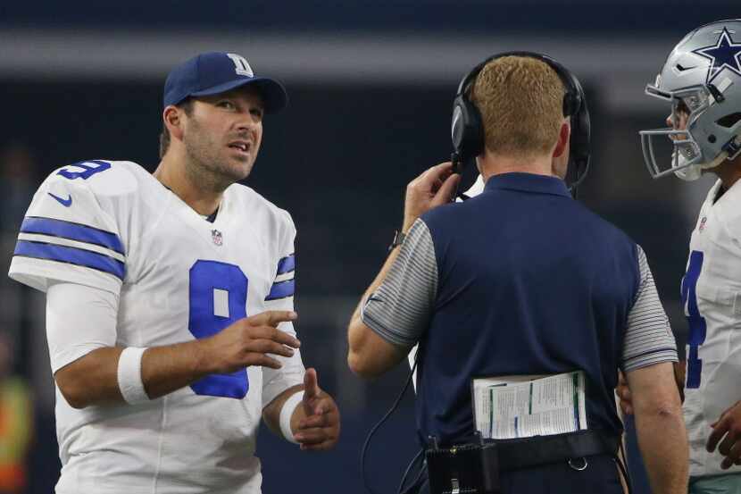 Dallas Cowboys quarterback Tony Romo (9), head coach Jason Garrett and quarterback Dak...
