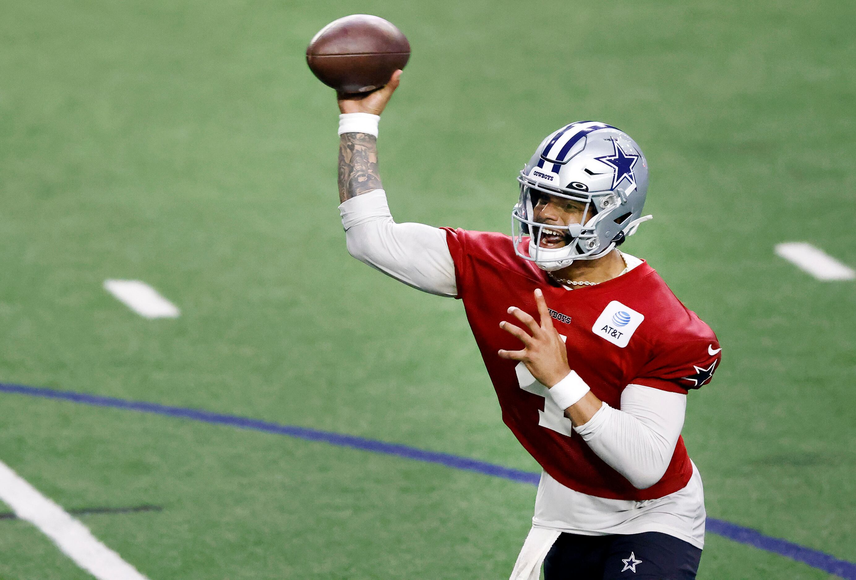 Dallas Cowboys quarterback Dak Prescott (4) throws a pass during a mini camp session at The...