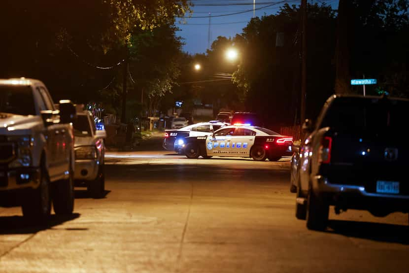 Police block the intersection of Ingersoll and Hiawatha street during a vigil for Aureanna...