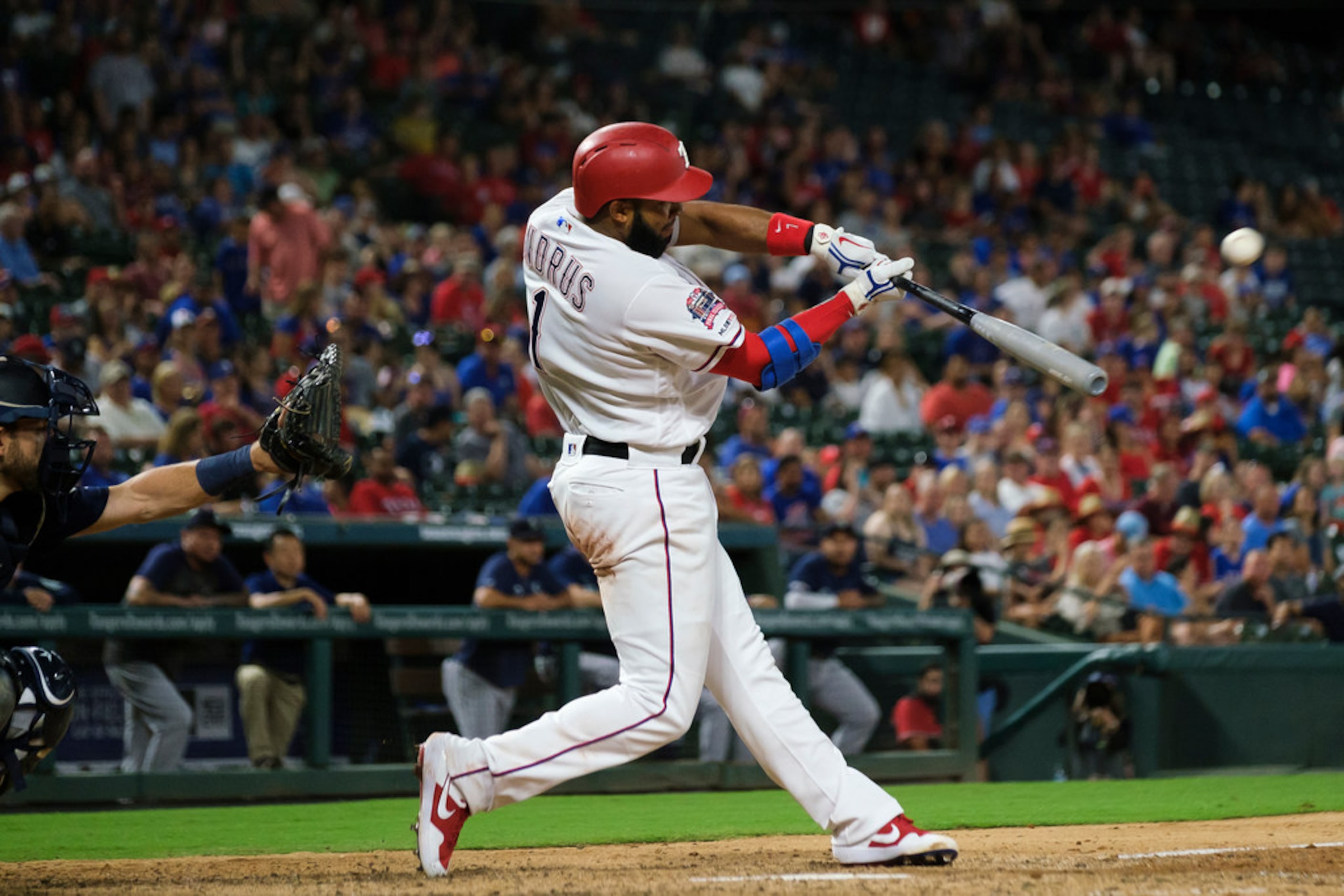 Texas Rangers shortstop Elvis Andrus doubles to lead off the bottom of the ninth inning...