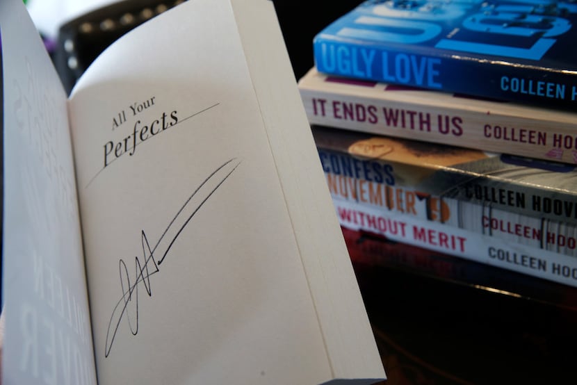A signed copy of All Your Perfects by Colleen Hoover at her bookstore  in Sulphur Springs,...