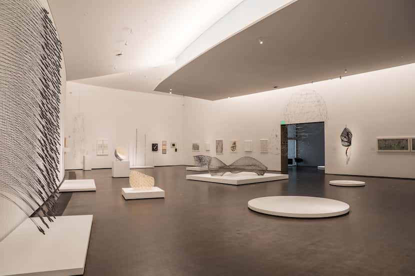 Within the galleries, light is controlled from above, pricking out of flanges in the ceiling.