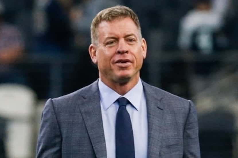 Troy Aikman walks the field prior to an NFL matchup between the Dallas Cowboys and the Los...