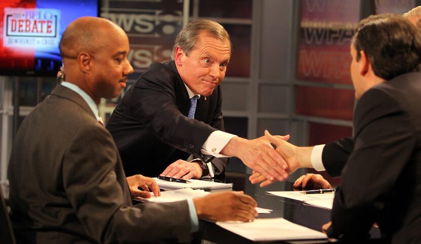 Lt. Gov. David Dewhurst shakes hands with Ted Cruz after debating at WFAA's studio in...