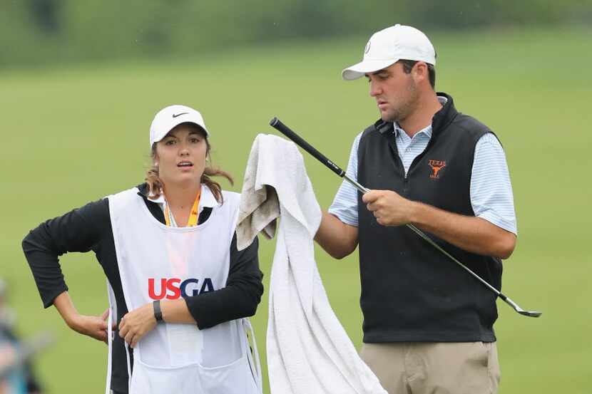 OAKMONT, PA - JUNE 16:  Amatuer Scottie Scheffler of the United States talks with his caddie...