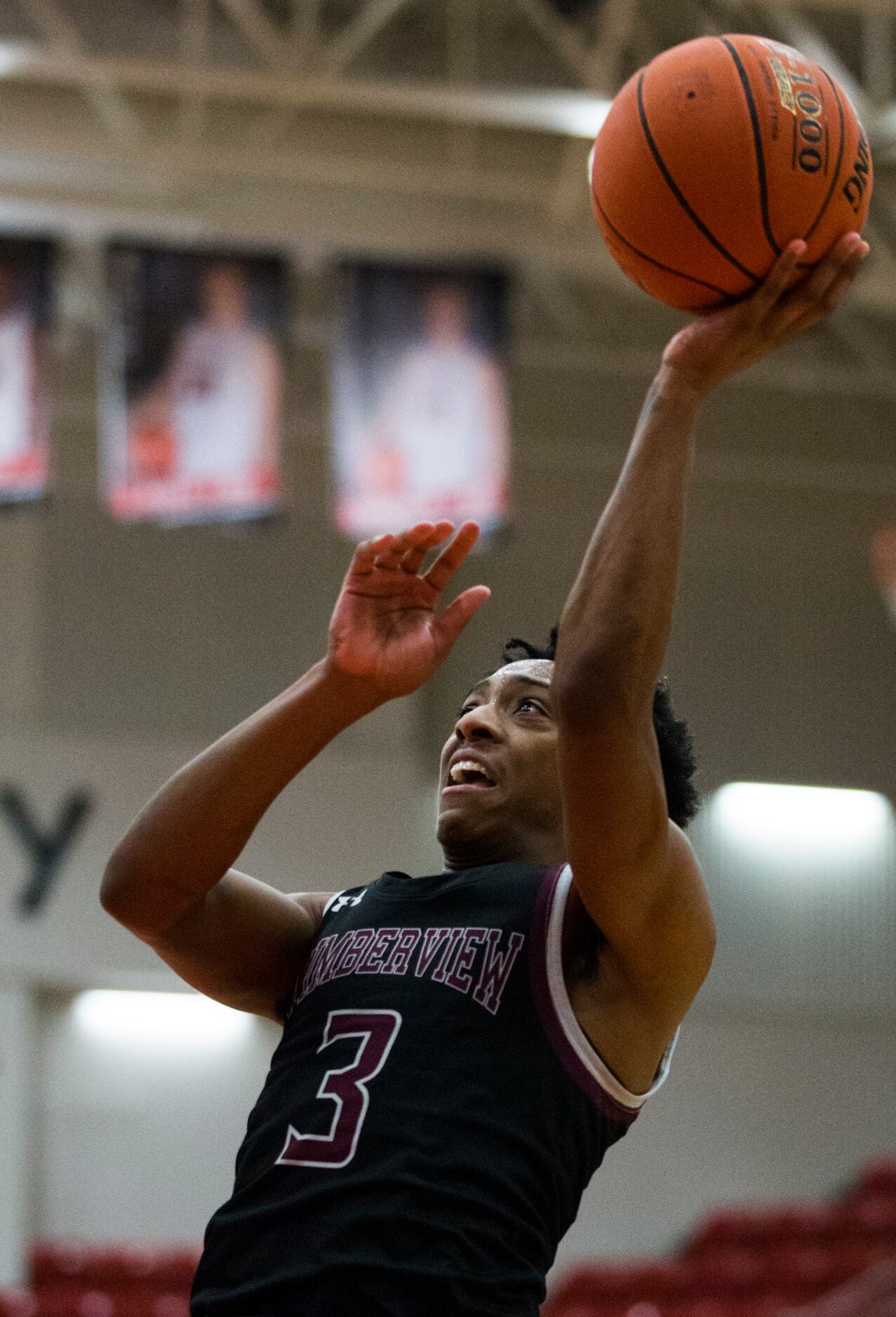 Mansfield Timberview guard Davontae McKinney (3) goes up for a shot during the first quarter...