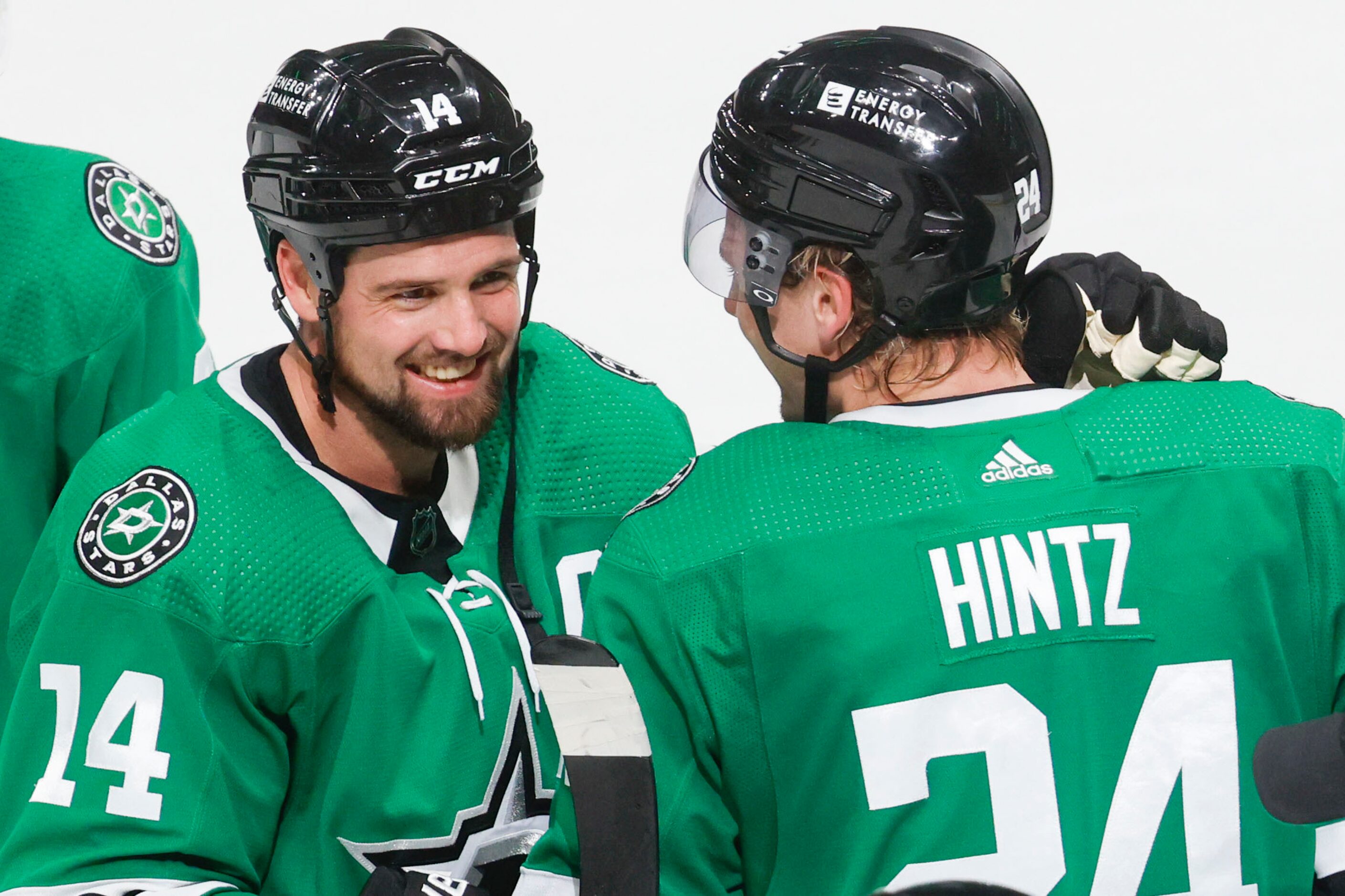 Dallas Stars left wing Jamie Benn (14) congratulates Dallas Stars center Roope Hintz (24)...