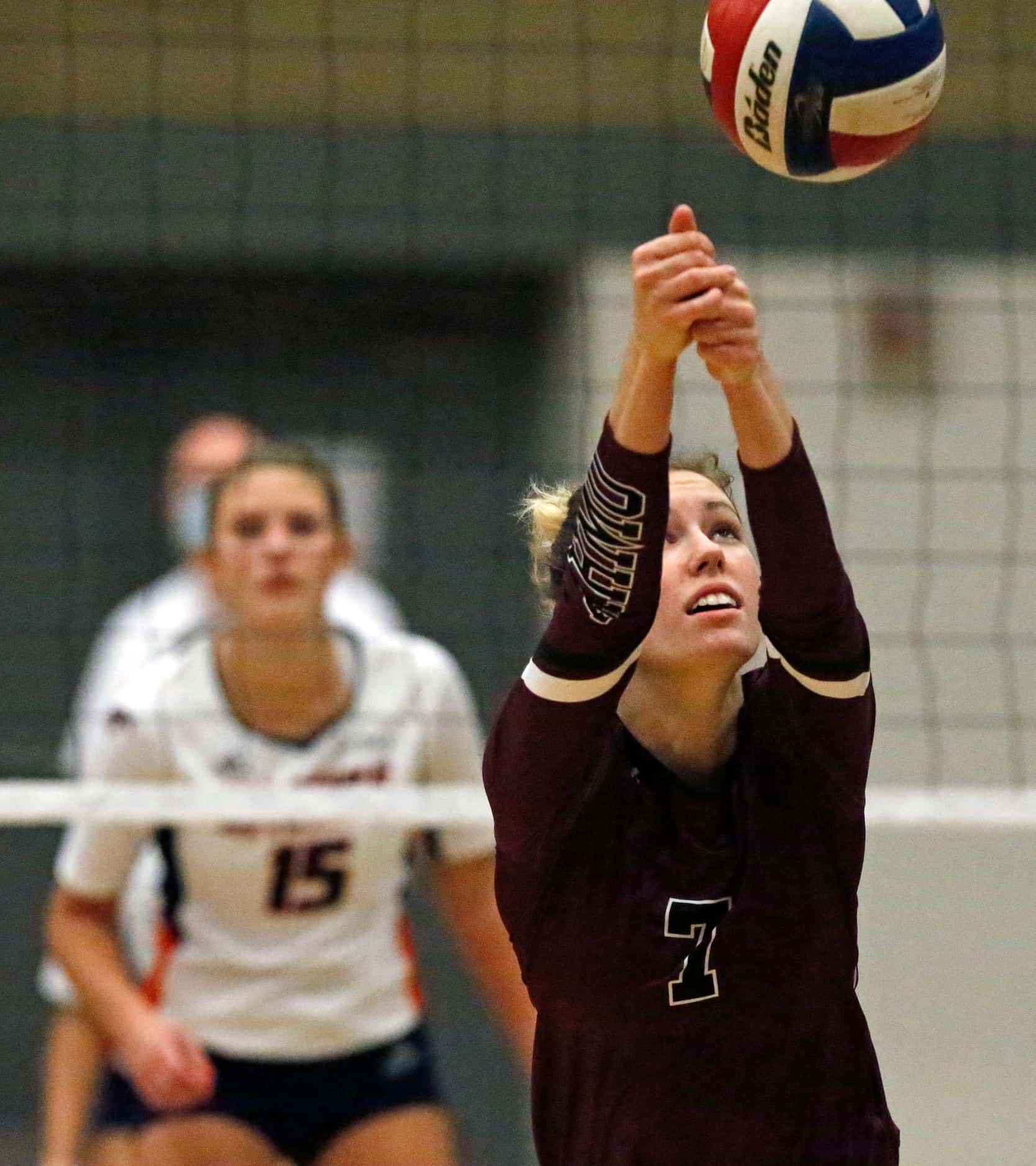 Wylie High School setter Izzy Jones (7) keeps the volley alive during game two as Sachse...