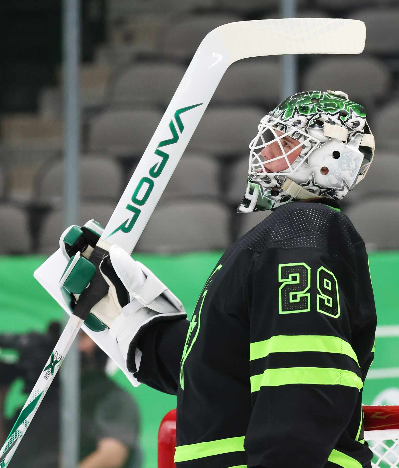 Dallas Stars goaltender Jake Oettinger (29) watches a replay after the Dallas Stars scored...