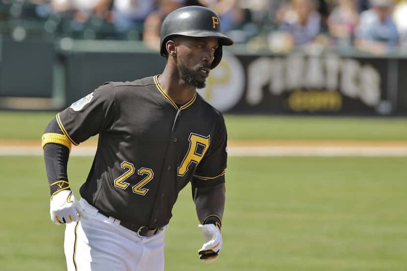Pittsburgh Pirates' Andrew McCutchen runs around the bases after his home run off Tampa Bay...
