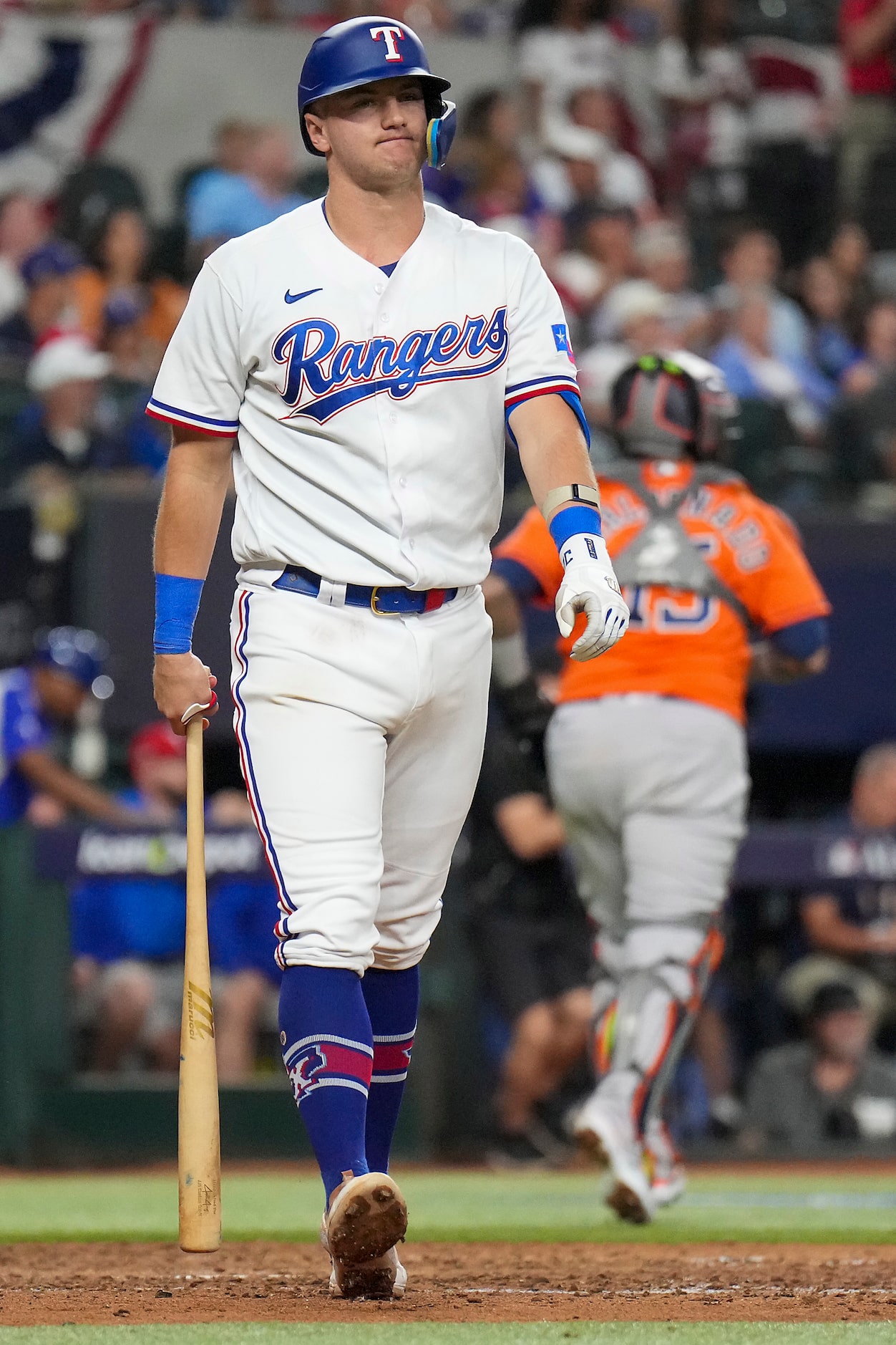 Texas Rangers third baseman Josh Jung  reacts after being called out on strikes to end the...