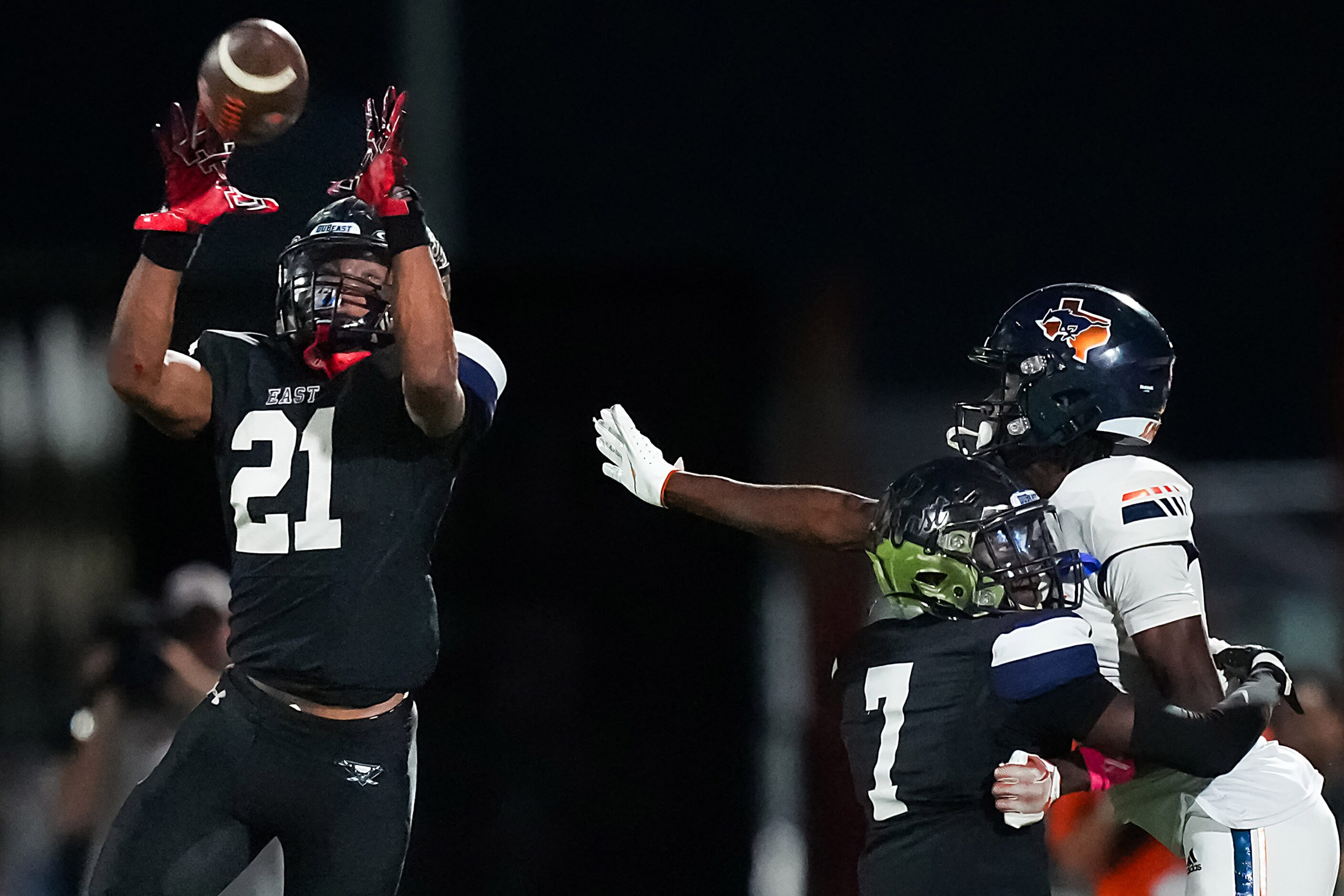 Wylie East defensive back Michael Henderson III (21) intercepts a pass intended for Sachse...