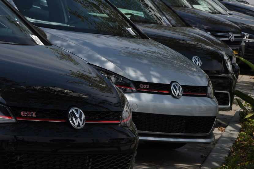 (FILES) This file photo taken on June 28, 2016 shows Volkswagen cars at a dealership in Los...