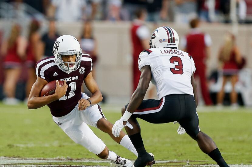 COLLEGE STATION, TX - SEPTEMBER 30:  Kellen Mond #11 of the Texas A&M Aggies attempts to get...