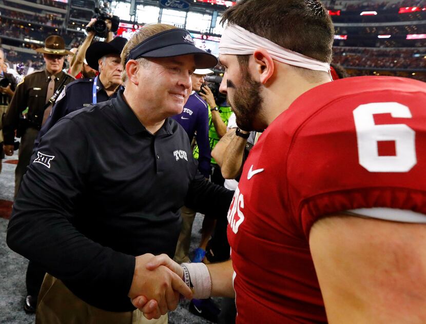 Oklahoma Sooners quarterback Baker Mayfield (6) is congratulated by TCU Horned Frogs head...