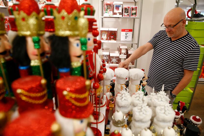 Jim Besta looks at nutcrackers in the holiday section of J.C. Penney at Collin Creek Mall in...