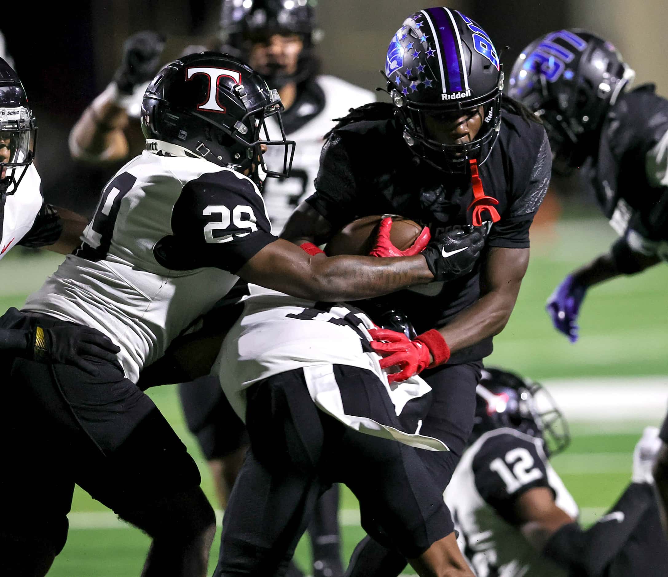 North Crowley wide receiver Dekoryian West-Davis (3) fights for yardage against Euless...