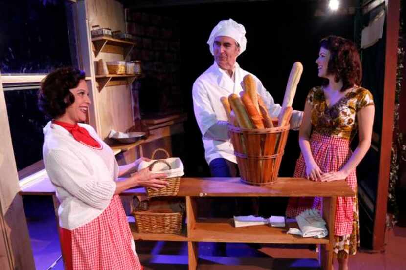 
Bill Jenkins (center) as Aimable the baker and Katie Moyes-Williams (right) as Genevieve...