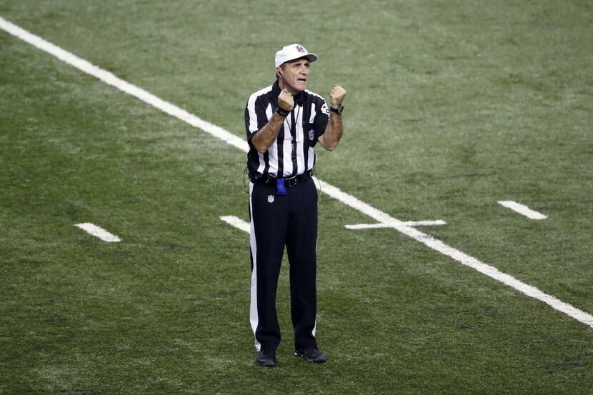 Referee Pete Morelli gives a call during an NFL football game between the Detroit Lions and...