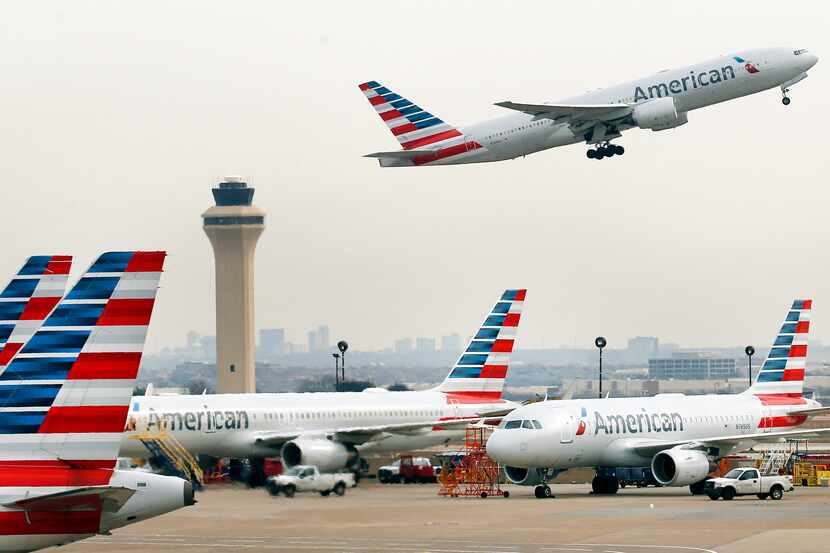 An American Airlines flight take off from Dallas-Fort Worth International Airport, Tuesday,...