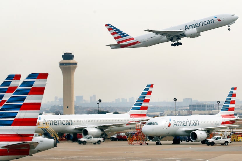 An American Airlines flight take off from Dallas-Fort Worth International Airport, Tuesday,...
