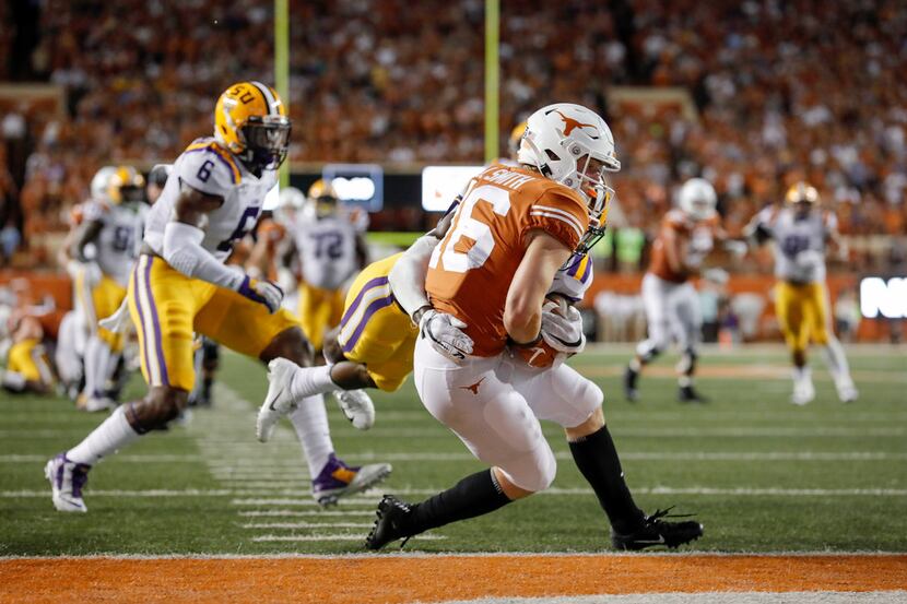 AUSTIN, TX - SEPTEMBER 07:  Jake Smith #16 of the Texas Longhorns catches a pass for a...