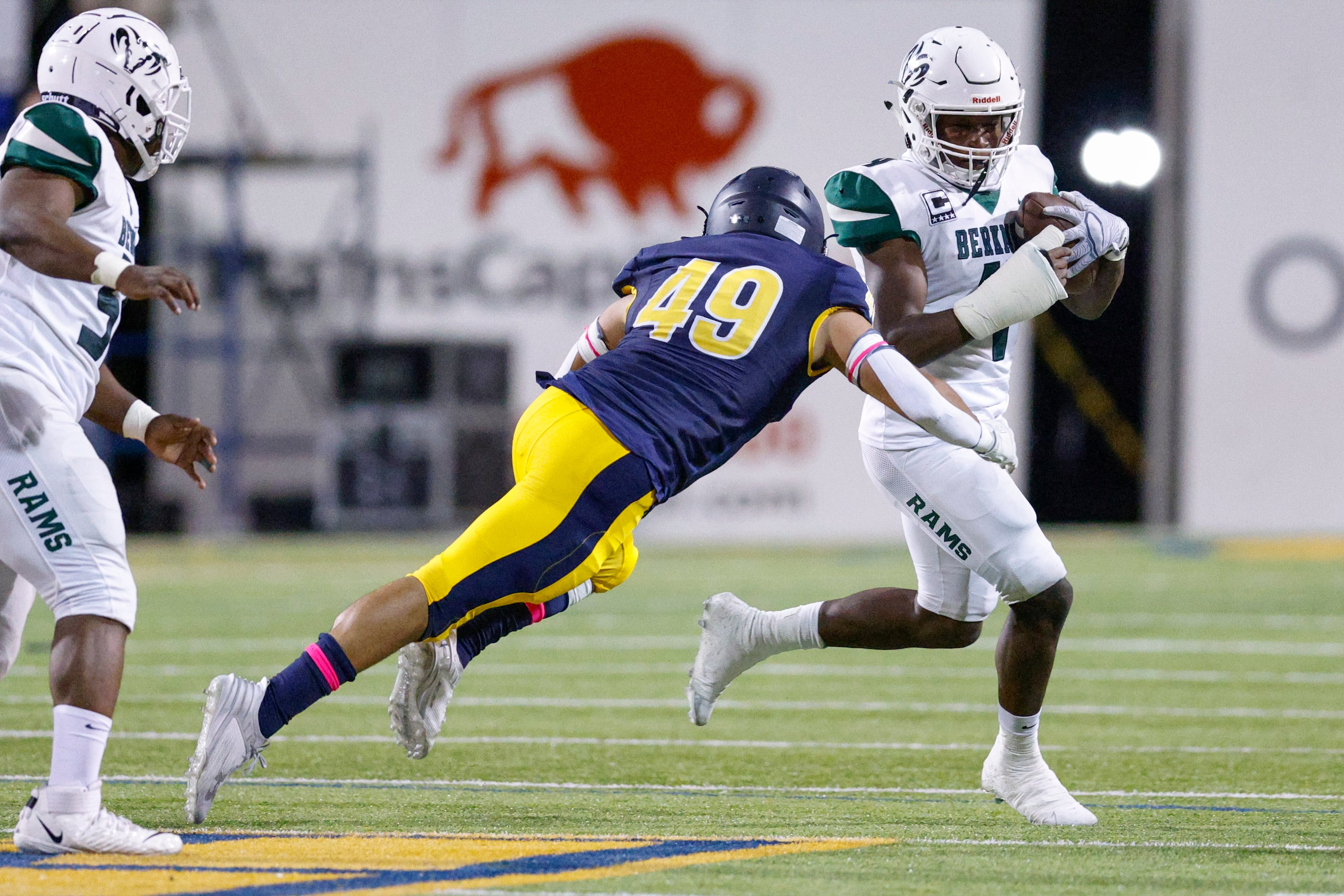 Highland Park linebacker Jack Morse (49) tackles Richardson Berkner running back Jamary...