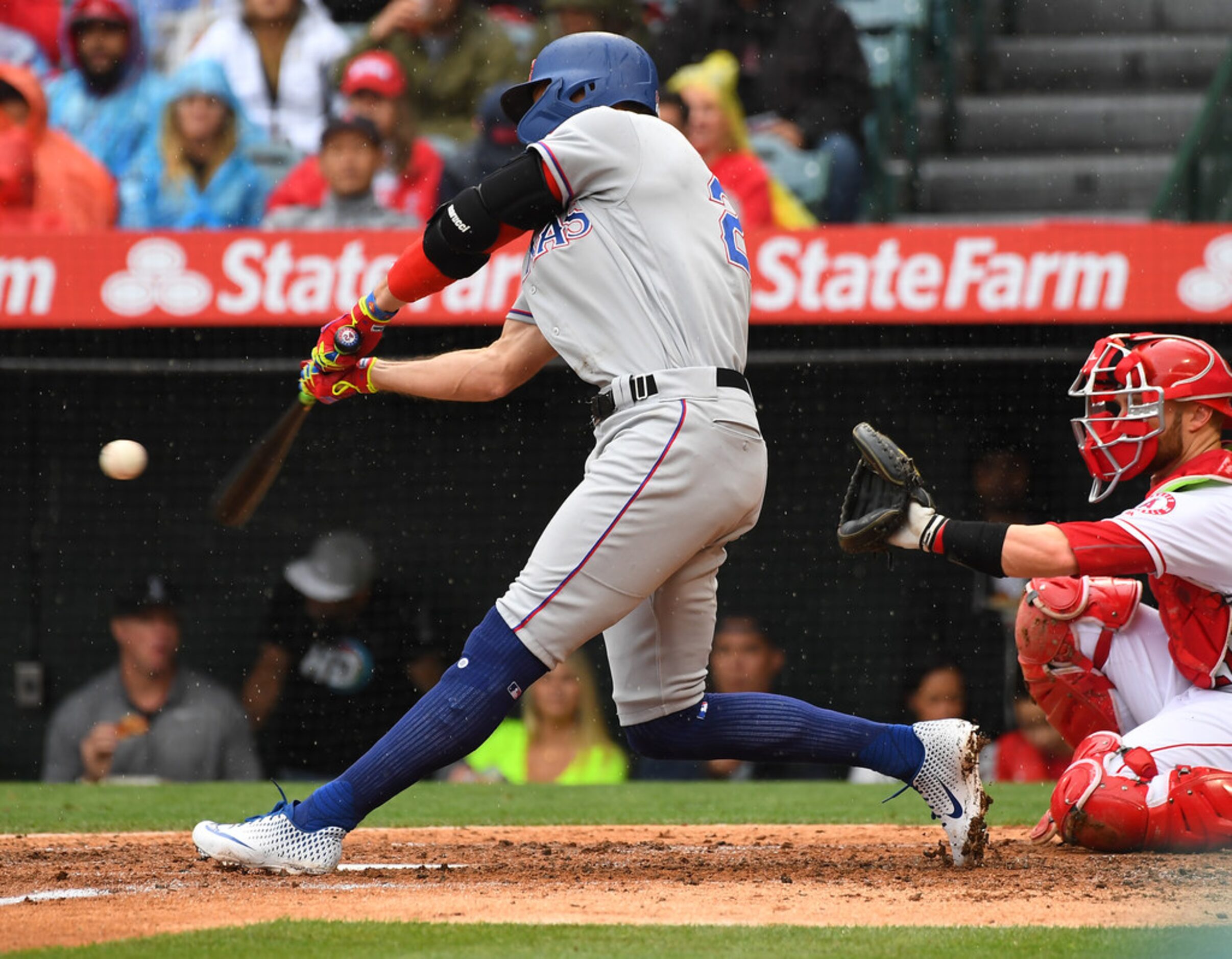 ANAHEIM, CA - MAY 26: Hunter Pence #24 of the Texas Rangers hits a solo home run in the...