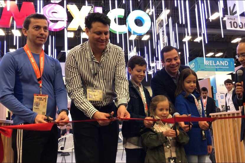 Mexican officials and their children inaugurate the opening of Mexico's pavilion at the...