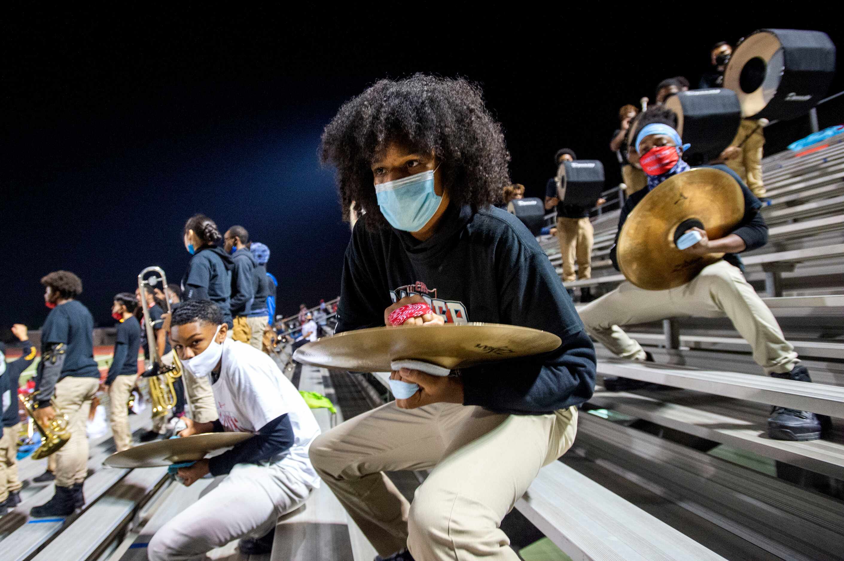 Carter sophomore Sakari Hastings plays the cymbals during the first half of a high school...