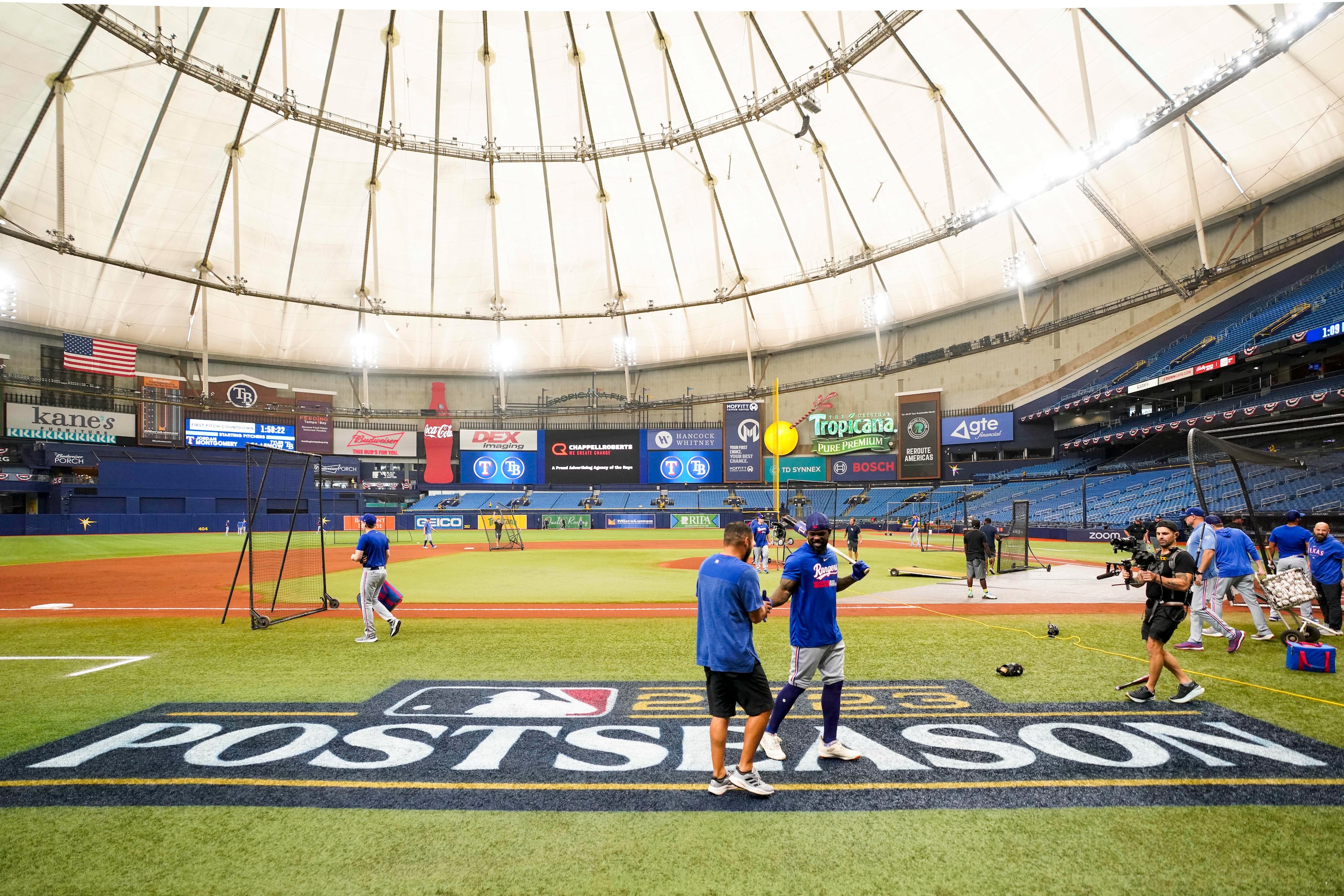 Texas Rangers right fielder Adolis Garcia takes the field to warm up before an  American...