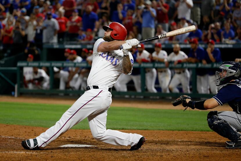 Texas Rangers first baseman Mike Napoli (5) hits a 3-run walkoff home run to win the game...