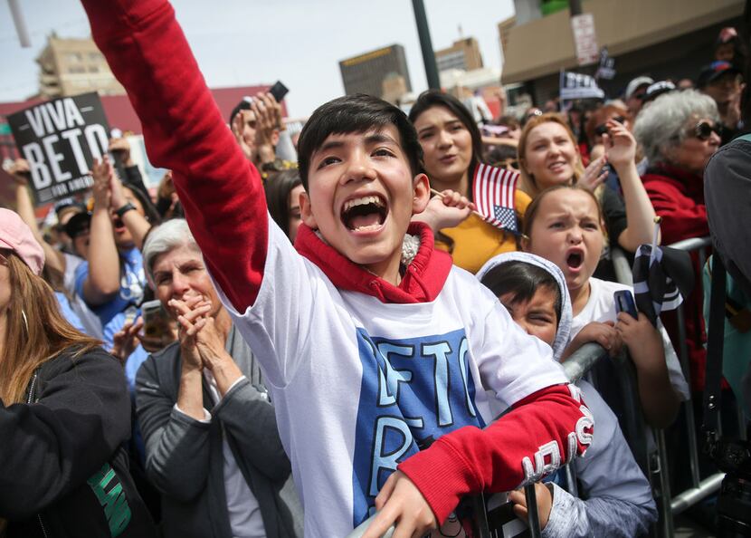 Fans cheer as Beto O'Rourke speaks at his presidential campaign kick-off rally in downtown...