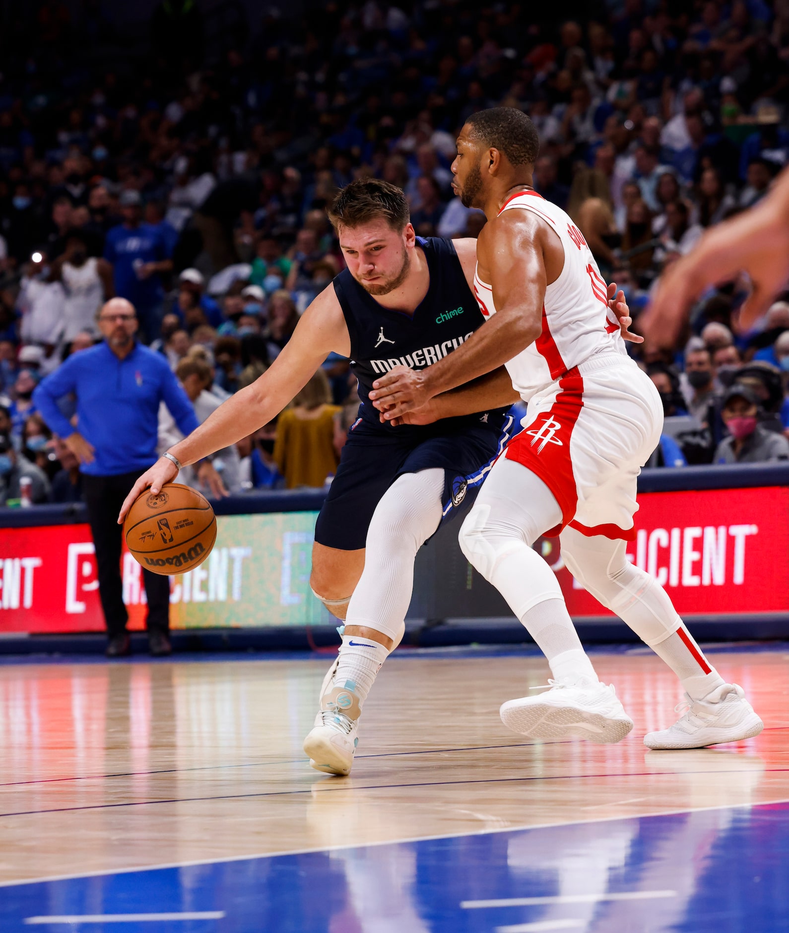 Dallas Mavericks guard Luka Dončić (77) drives past Houston Rockets guard Eric Gordon (10)...