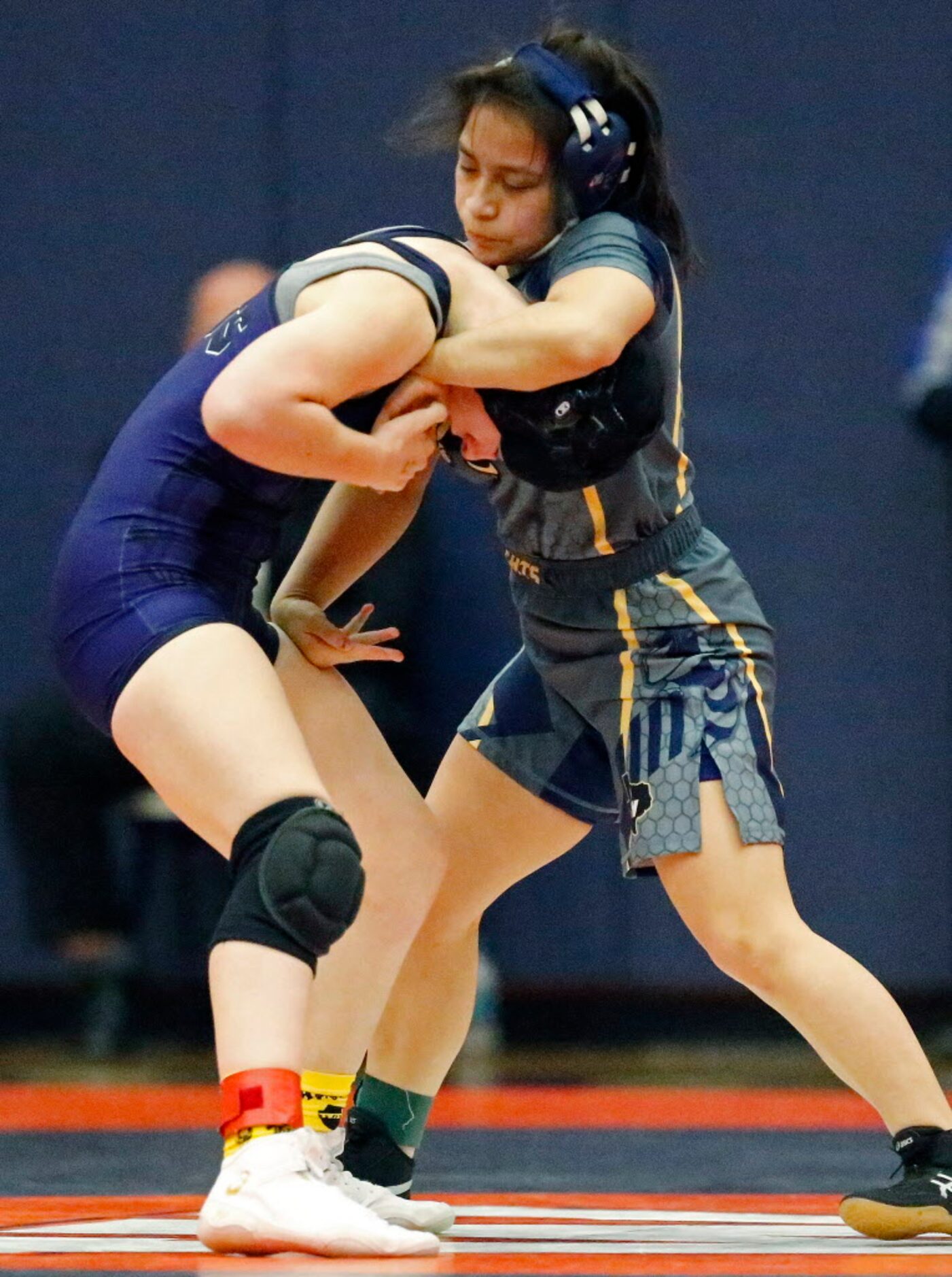 Tabitha Wood (bottom) of Frisco Independence High School, competes with Amanda Diaz of Fort...