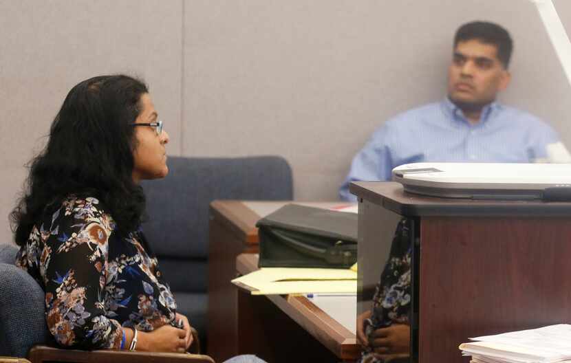 Sini and Wesley Mathew, parents of Sherin Mathews, waited in a courtroom during their child...